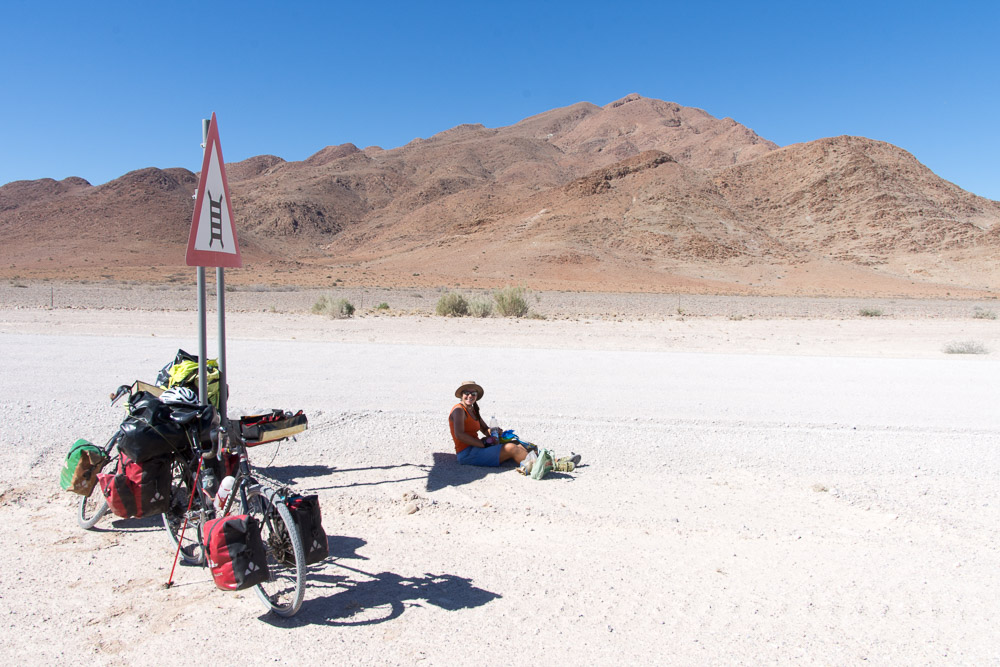 Emily takes full advantage of the 'triangle of shade'!